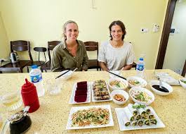 Guests sitting together to enjoy a meal