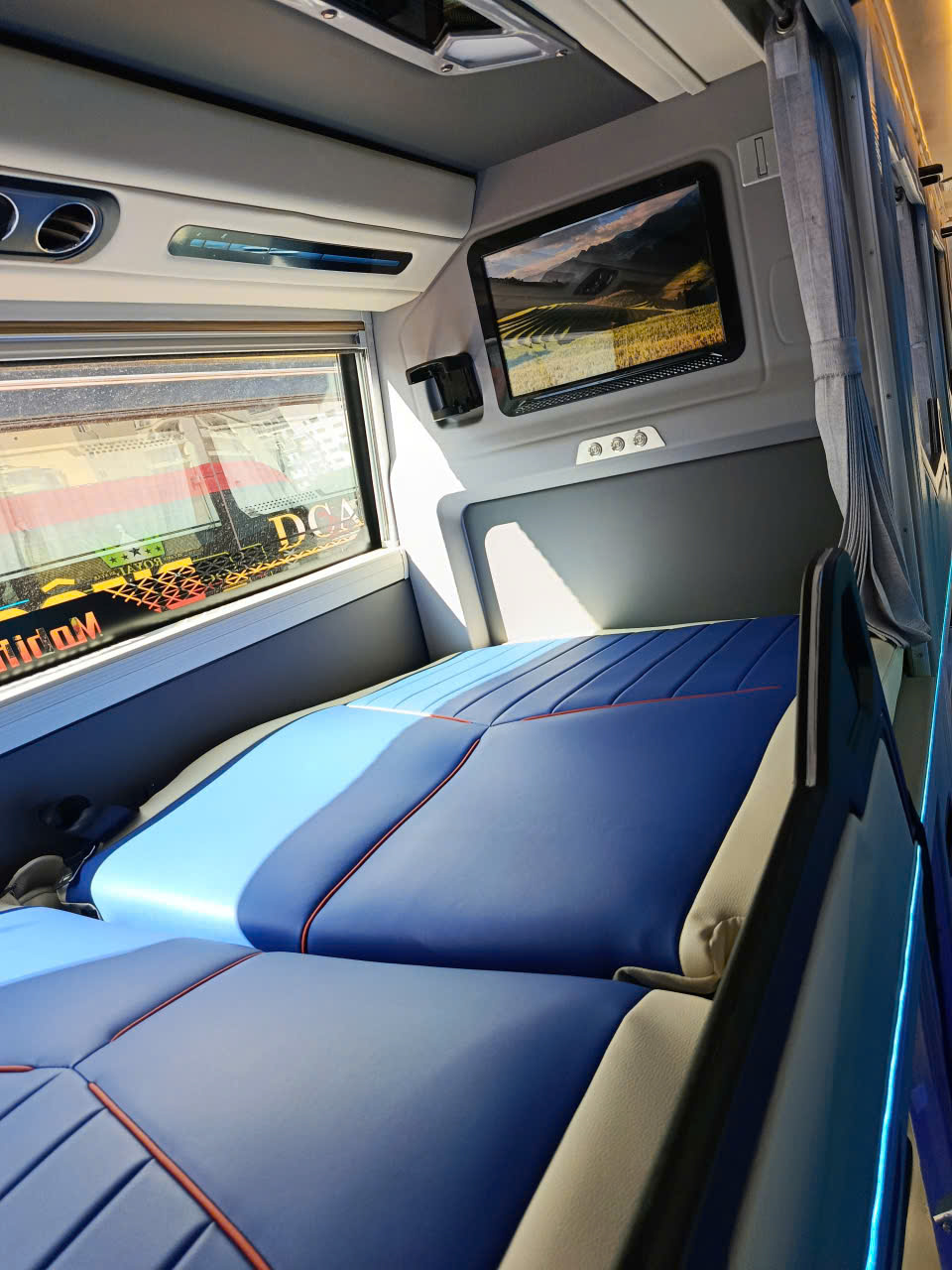 Sleeping berth inside a cabin bus from Sapa
