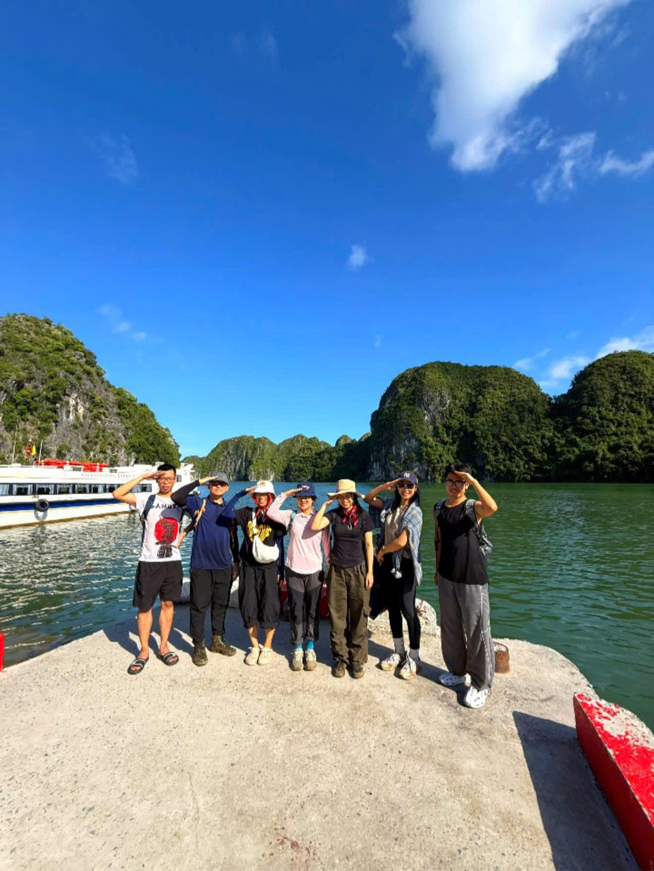 The trekking group beside Lan Ha Bay